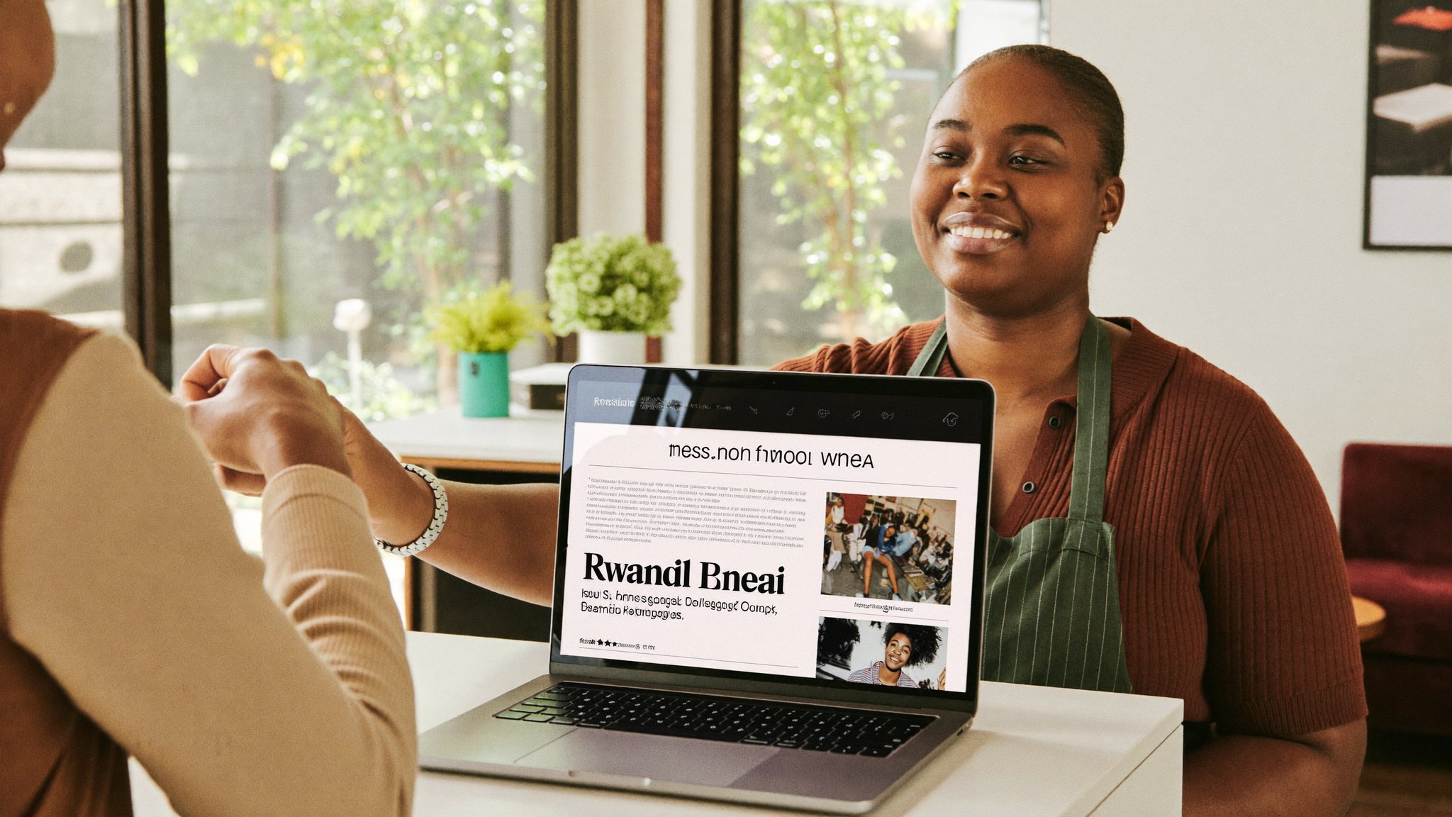 A trustworthy Rwandan businesswoman warmly greeting a happy customer in her Kigali shop with her professional website shown on a laptop